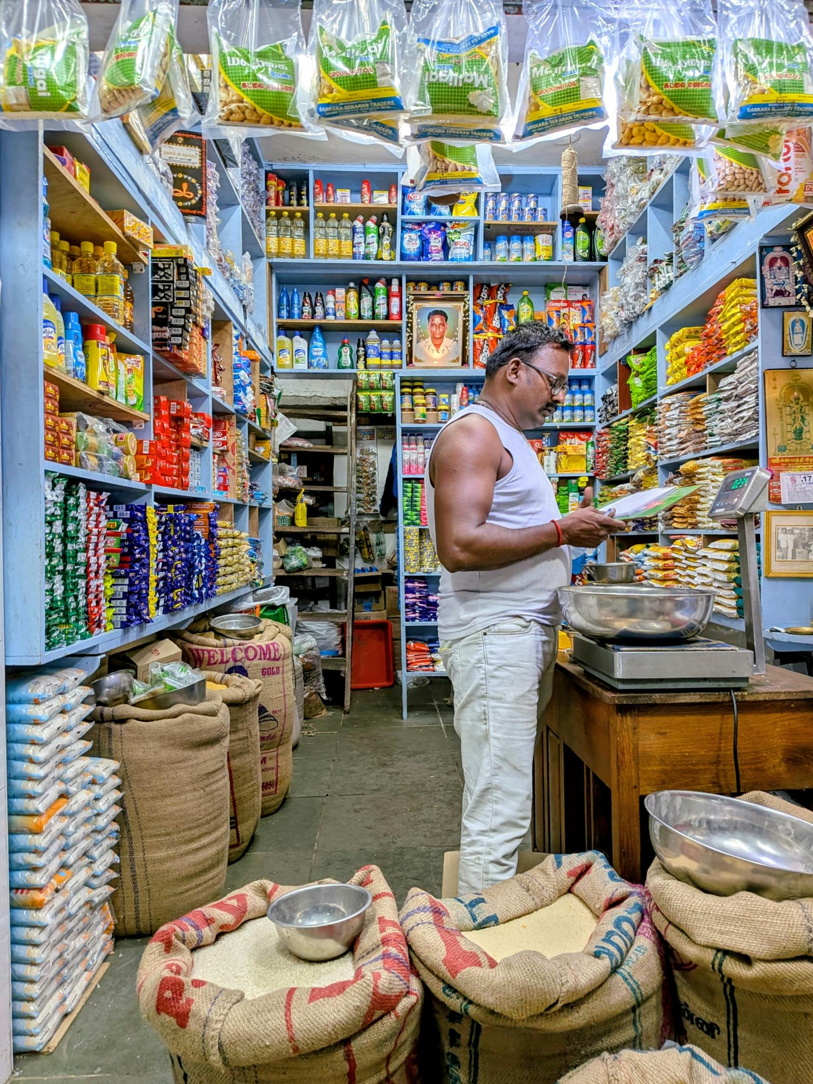 Wide view of a fully stocked convenience store aisle